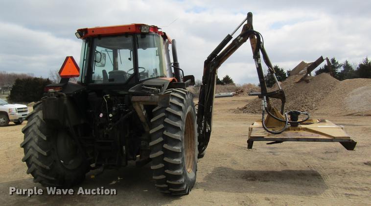 image for item DC4427 AGCO RT95 MFWD tractor with side boom mower