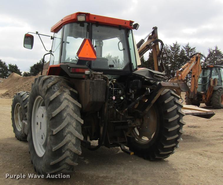 image for item DC4427 AGCO RT95 MFWD tractor with side boom mower