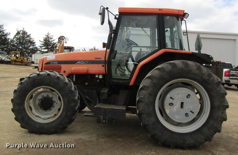 image for item DC4427 AGCO RT95 MFWD tractor with side boom mower