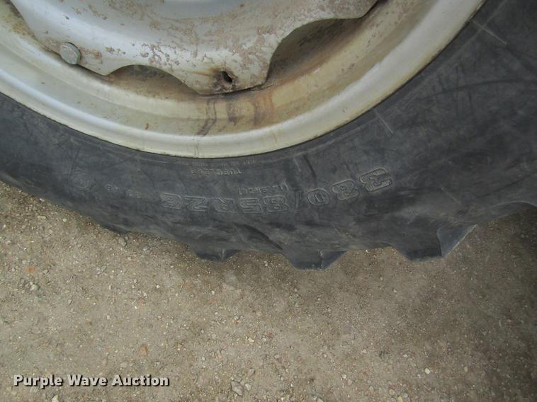 image for item DC4427 AGCO RT95 MFWD tractor with side boom mower