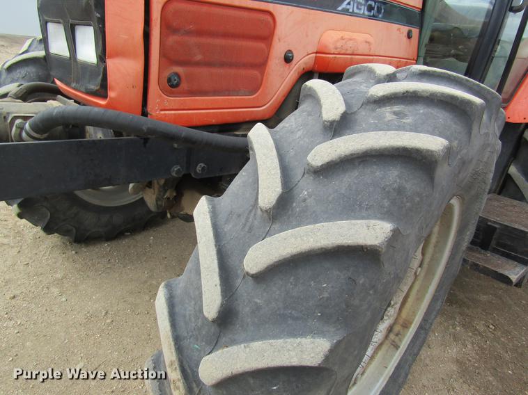 image for item DC4427 AGCO RT95 MFWD tractor with side boom mower