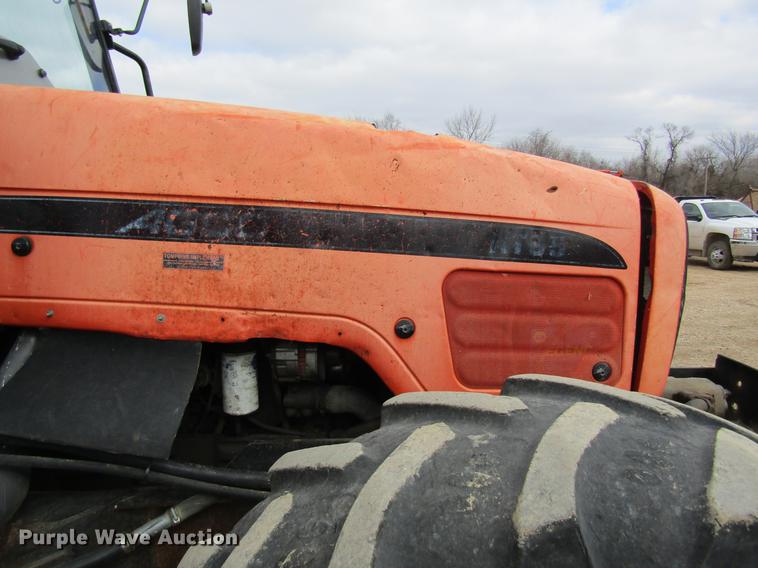 image for item DC4427 AGCO RT95 MFWD tractor with side boom mower