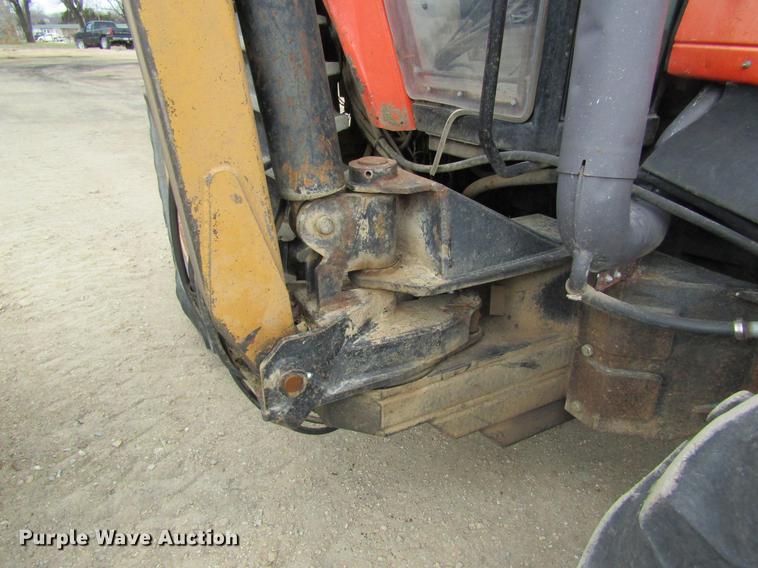 image for item DC4427 AGCO RT95 MFWD tractor with side boom mower