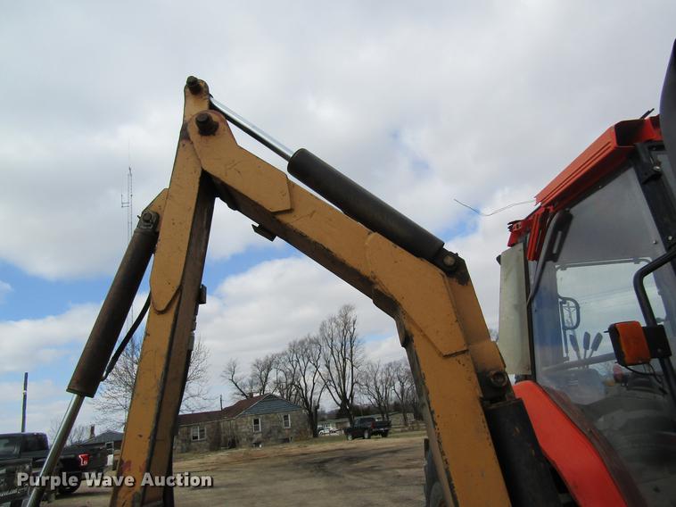 image for item DC4427 AGCO RT95 MFWD tractor with side boom mower