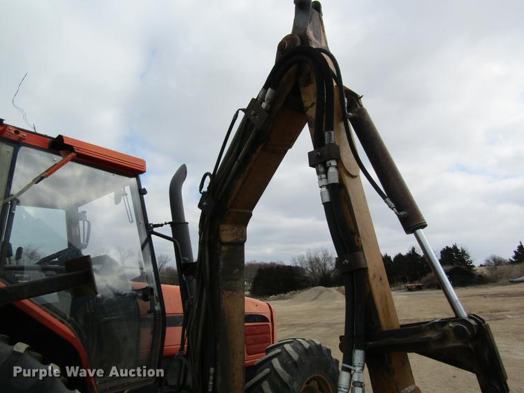 image for item DC4427 AGCO RT95 MFWD tractor with side boom mower