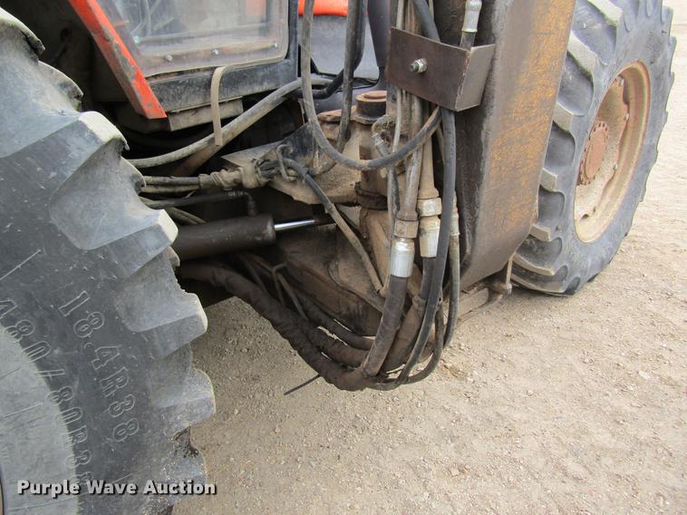 image for item DC4427 AGCO RT95 MFWD tractor with side boom mower