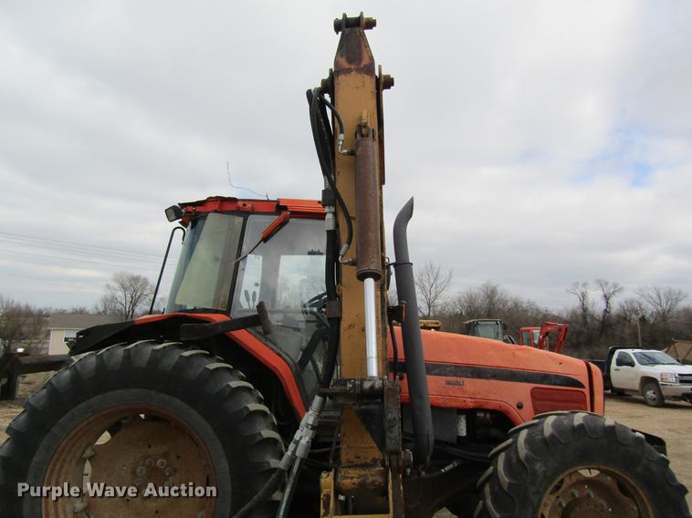 image for item DC4427 AGCO RT95 MFWD tractor with side boom mower