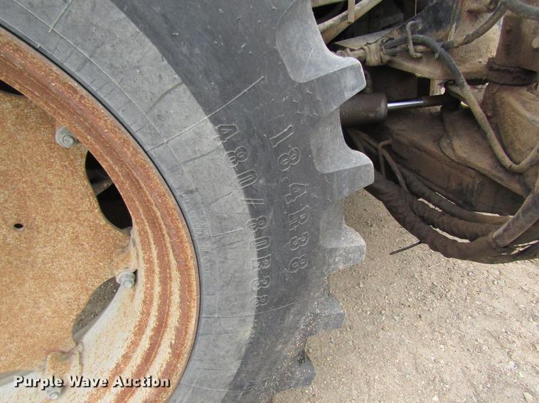 image for item DC4427 AGCO RT95 MFWD tractor with side boom mower