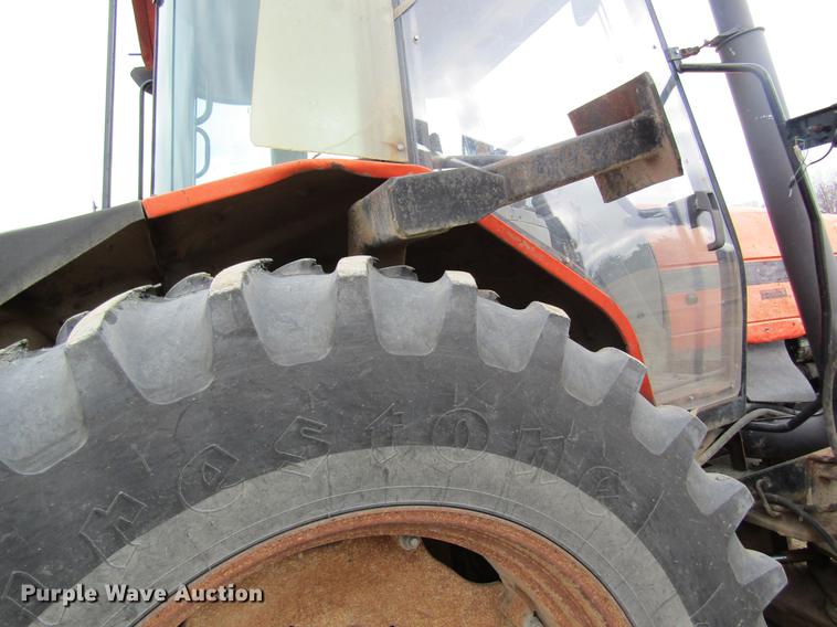 image for item DC4427 AGCO RT95 MFWD tractor with side boom mower