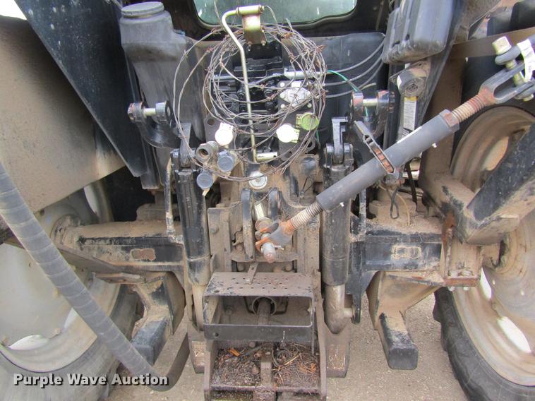 image for item DC4427 AGCO RT95 MFWD tractor with side boom mower