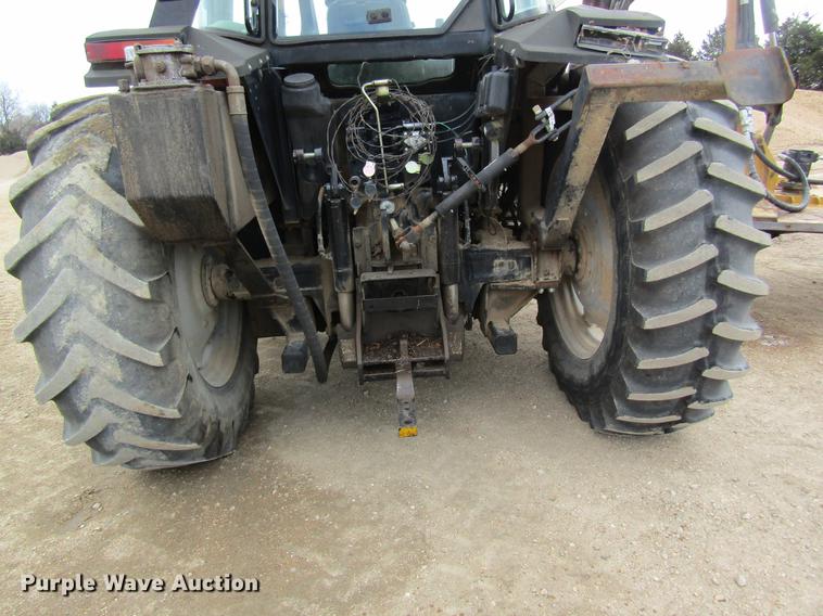 image for item DC4427 AGCO RT95 MFWD tractor with side boom mower
