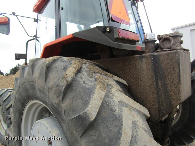 image for item DC4427 AGCO RT95 MFWD tractor with side boom mower