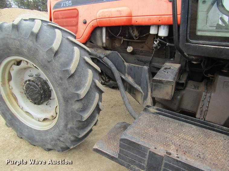 image for item DC4427 AGCO RT95 MFWD tractor with side boom mower
