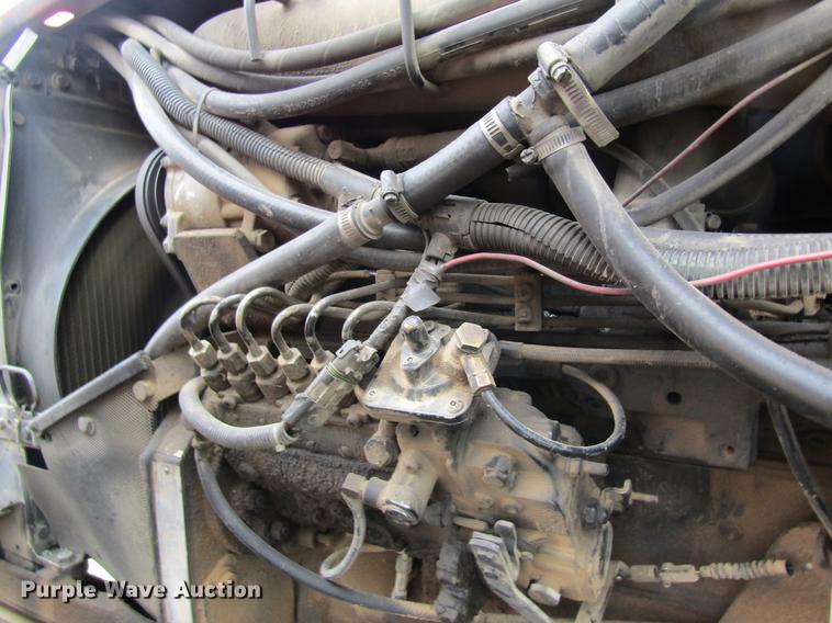 image for item DC4427 AGCO RT95 MFWD tractor with side boom mower