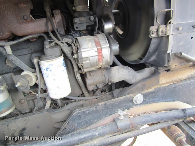 image for item DC4427 AGCO RT95 MFWD tractor with side boom mower