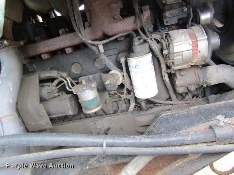 image for item DC4427 AGCO RT95 MFWD tractor with side boom mower