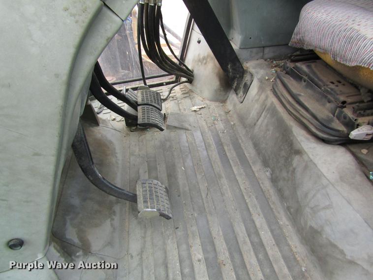 image for item DC4427 AGCO RT95 MFWD tractor with side boom mower