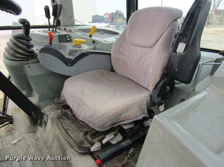 image for item DC4427 AGCO RT95 MFWD tractor with side boom mower