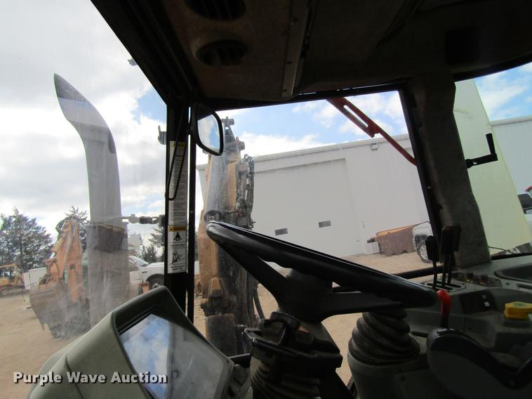 image for item DC4427 AGCO RT95 MFWD tractor with side boom mower