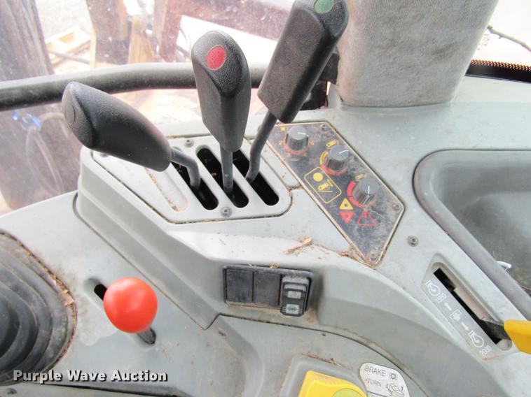 image for item DC4427 AGCO RT95 MFWD tractor with side boom mower