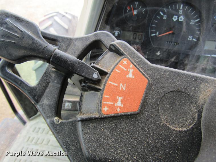 image for item DC4427 AGCO RT95 MFWD tractor with side boom mower