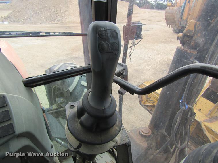 image for item DC4427 AGCO RT95 MFWD tractor with side boom mower