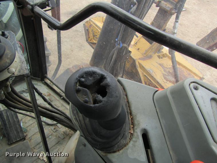 image for item DC4427 AGCO RT95 MFWD tractor with side boom mower