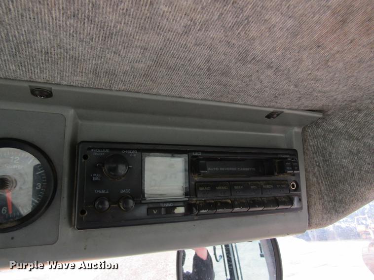 image for item DC4427 AGCO RT95 MFWD tractor with side boom mower