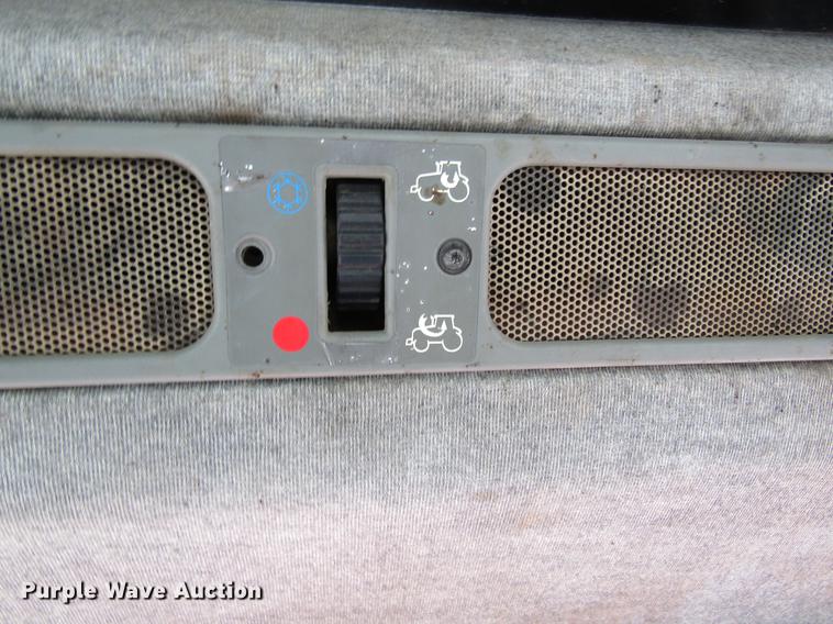 image for item DC4427 AGCO RT95 MFWD tractor with side boom mower