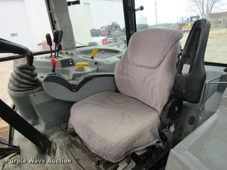 image for item DC4427 AGCO RT95 MFWD tractor with side boom mower