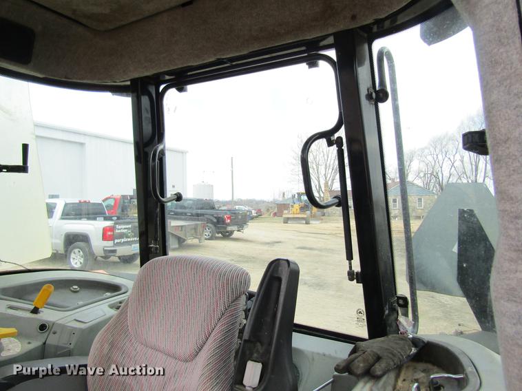 image for item DC4427 AGCO RT95 MFWD tractor with side boom mower