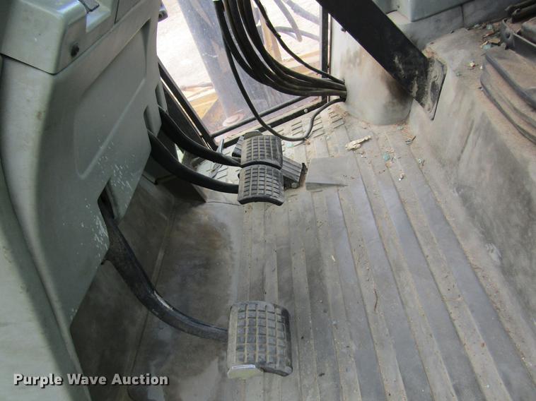 image for item DC4427 AGCO RT95 MFWD tractor with side boom mower