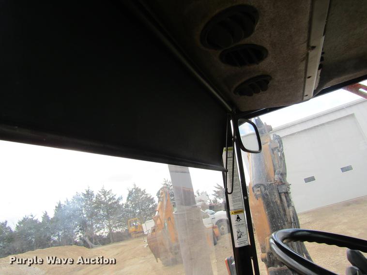 image for item DC4427 AGCO RT95 MFWD tractor with side boom mower