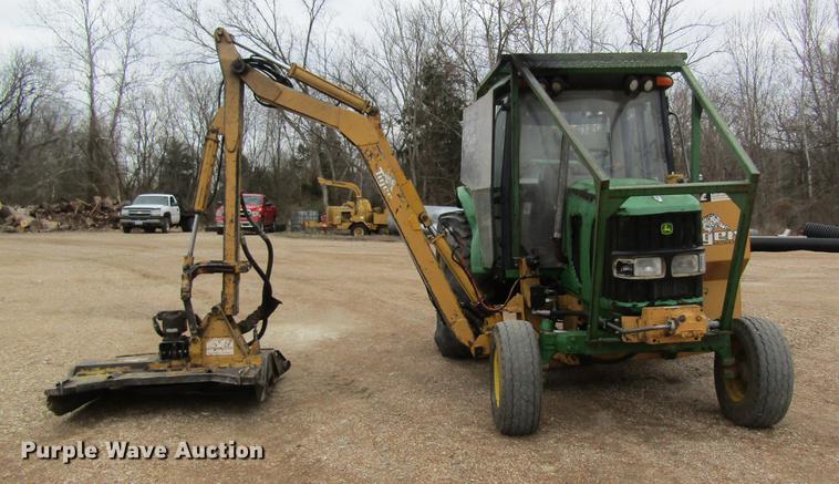 image for item DC4430 2002 John Deere 6420 tractor with side boom mower