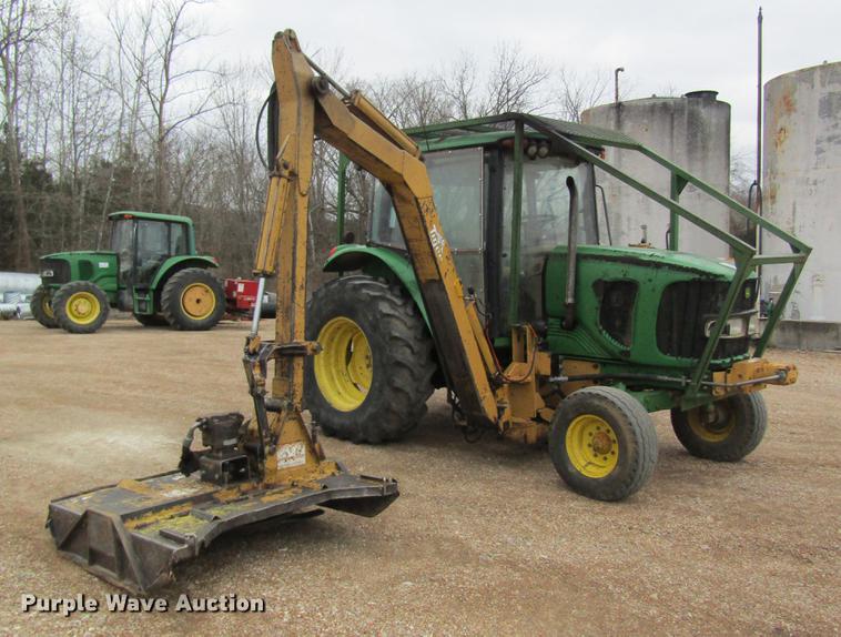 image for item DC4430 2002 John Deere 6420 tractor with side boom mower