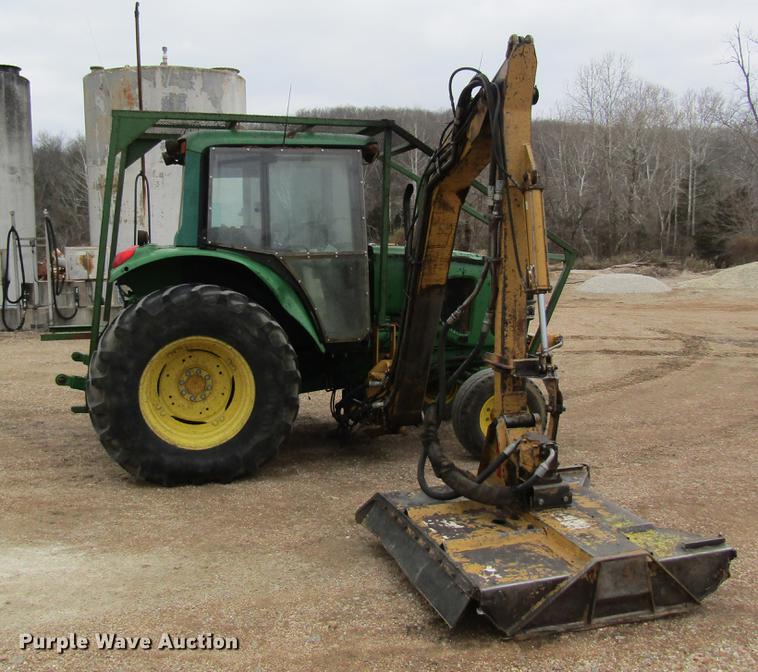 image for item DC4430 2002 John Deere 6420 tractor with side boom mower