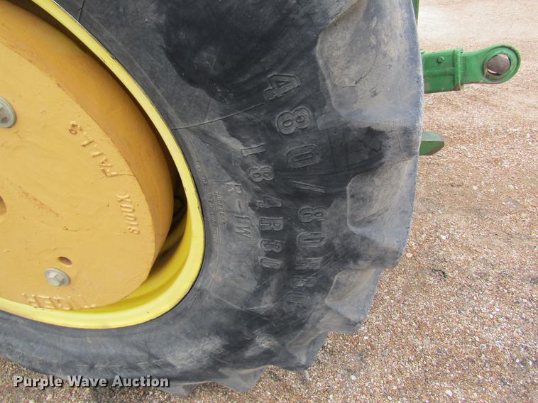 image for item DC4430 2002 John Deere 6420 tractor with side boom mower