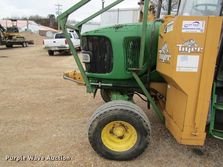 image for item DC4430 2002 John Deere 6420 tractor with side boom mower