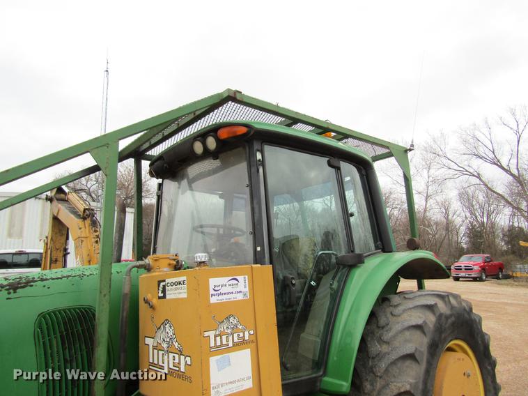 image for item DC4430 2002 John Deere 6420 tractor with side boom mower