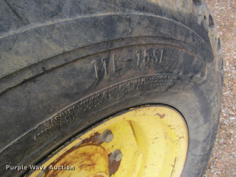 image for item DC4430 2002 John Deere 6420 tractor with side boom mower