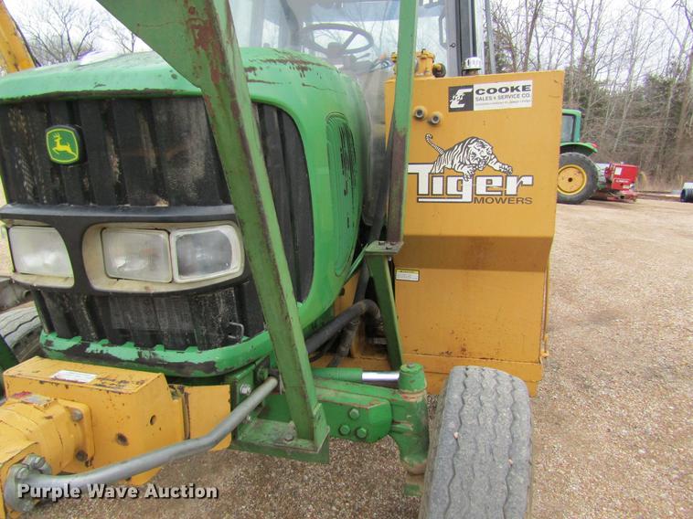 image for item DC4430 2002 John Deere 6420 tractor with side boom mower