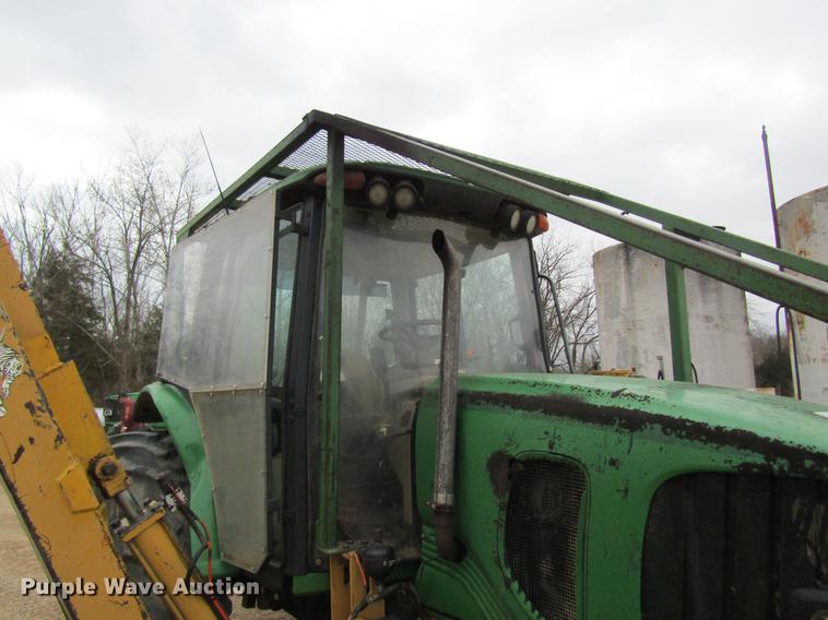 image for item DC4430 2002 John Deere 6420 tractor with side boom mower