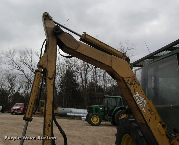 image for item DC4430 2002 John Deere 6420 tractor with side boom mower