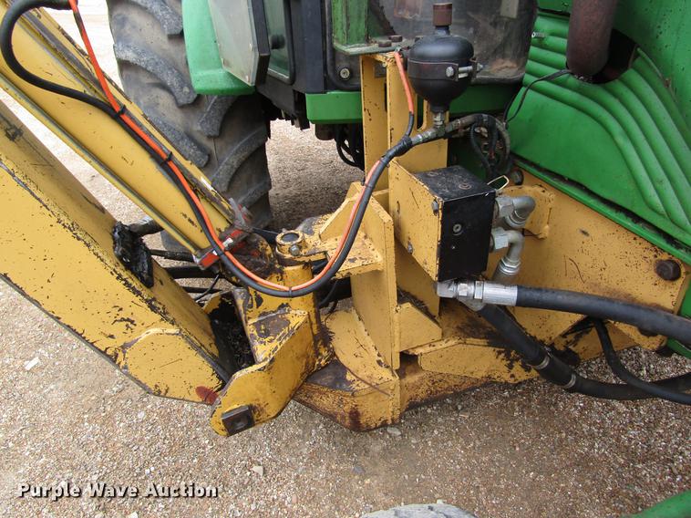 image for item DC4430 2002 John Deere 6420 tractor with side boom mower