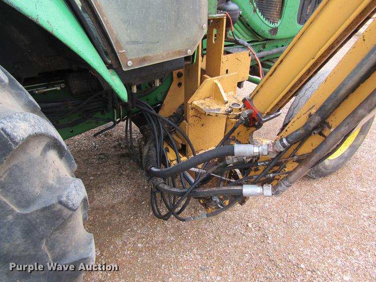 image for item DC4430 2002 John Deere 6420 tractor with side boom mower
