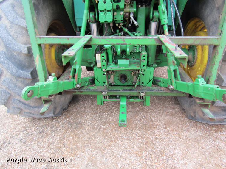 image for item DC4430 2002 John Deere 6420 tractor with side boom mower