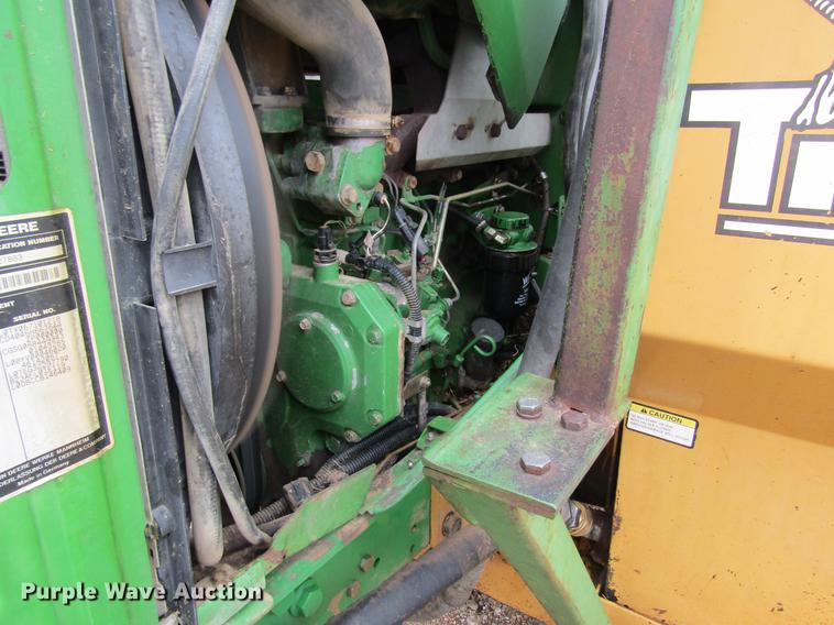 image for item DC4430 2002 John Deere 6420 tractor with side boom mower