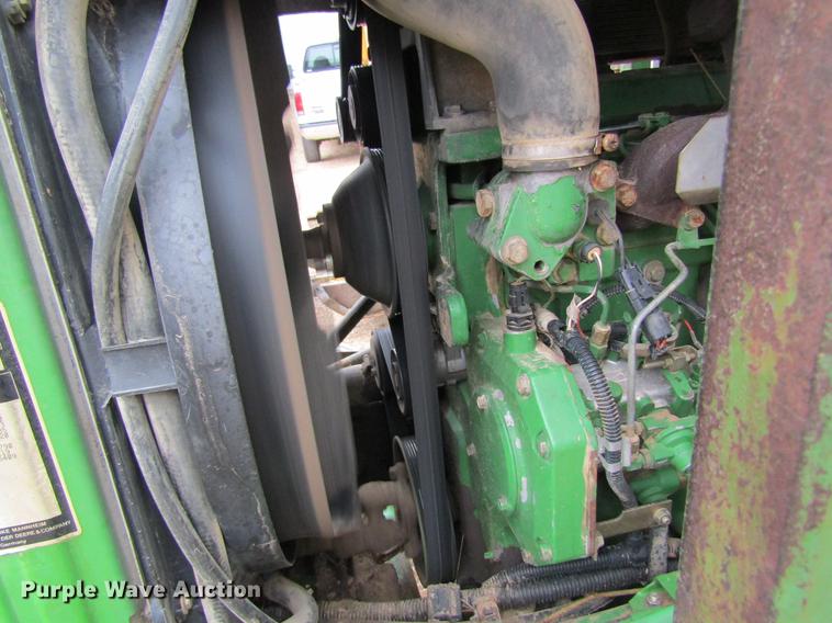 image for item DC4430 2002 John Deere 6420 tractor with side boom mower