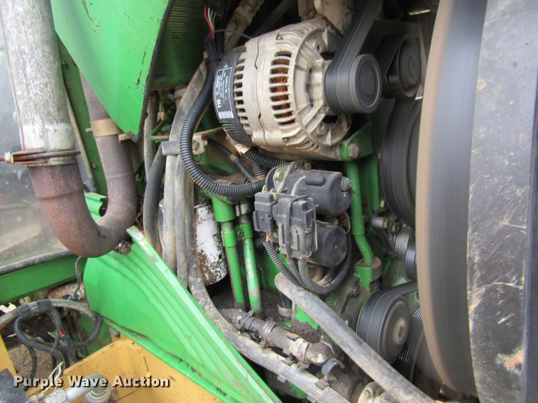 image for item DC4430 2002 John Deere 6420 tractor with side boom mower