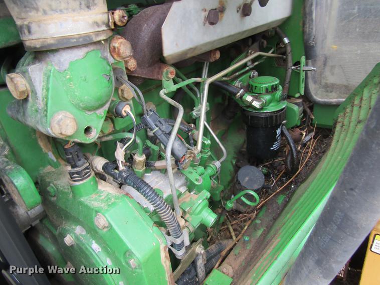 image for item DC4430 2002 John Deere 6420 tractor with side boom mower